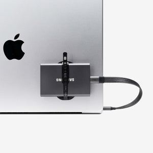 Samsung external drive secured to a laptop with a universal SCREENMOUNT to prevent dangling drives